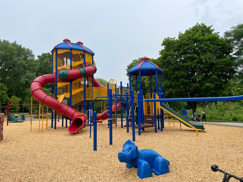 The large, colorful multi-area play equipment at Wolfe Playground.